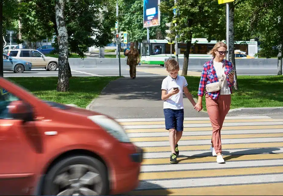 pedestrians almost getting hit by car at crosswalk