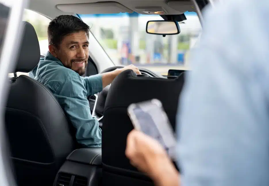 person getting into a rideshare car