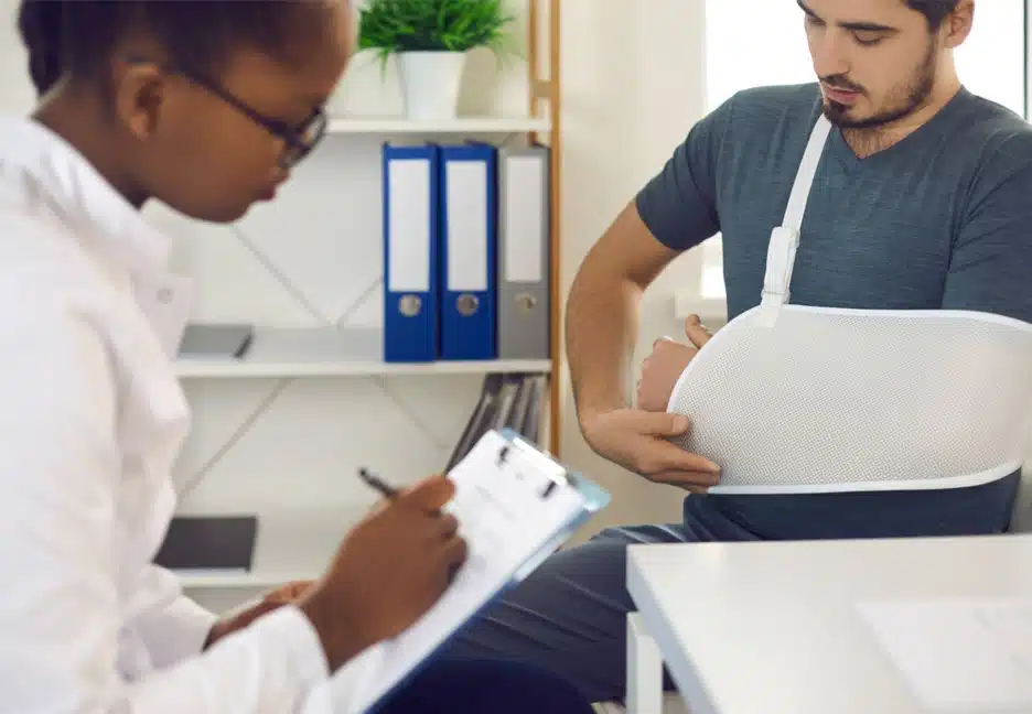 injured man meeting with doctor