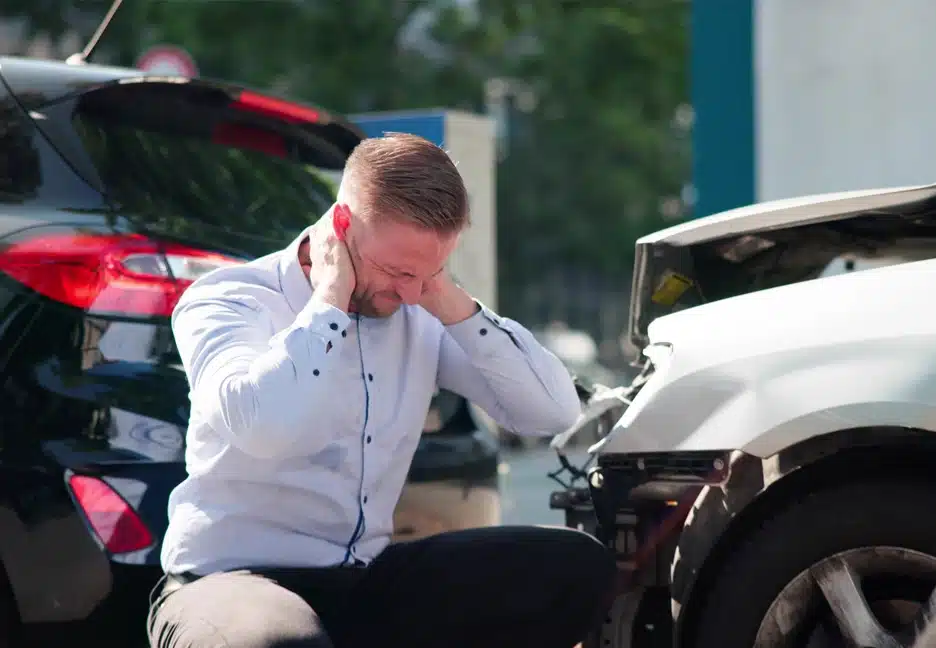 man with injured neck from car accident